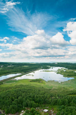 Railway between forests and lakes. Air viewの写真素材