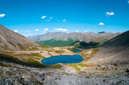 Small lake in big mountain in north of Russiaの写真素材