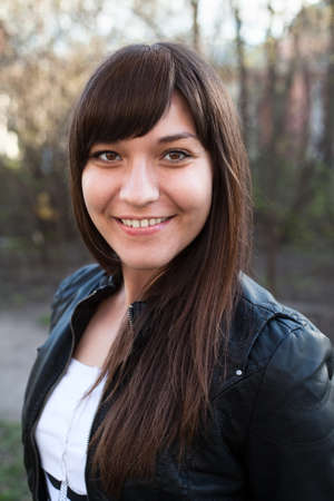 Portrait of beautiful happy smiling woman a brunetteの写真素材