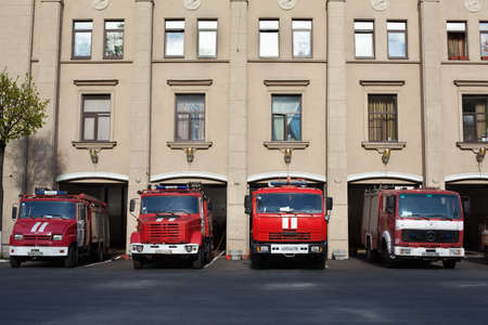 Saint-Petersburg, Russia - May 18, 2011 - Red Russian firefighting vehicles near garageのeditorial素材