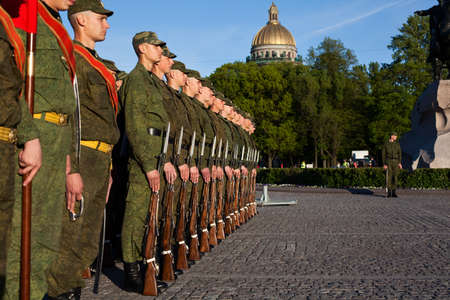 Saint-Petersburg, Russia - May 26 - Soldiers in the line near the monument to Peter the Great. City Day Celebration on Senate Squareのeditorial素材