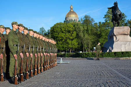 Saint-Petersburg, Russia - May 26 - Soldiers in the line near the monument to Peter the Great. City Day Celebration on Senate Squareのeditorial素材