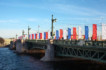 Saint-Petersburg, Russia - May 7, 2011: Palace Bridge is a foot bascule bridge spanning the Neva River decorated by flags before Victory Dayのeditorial素材