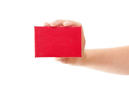 Red card in human hand isolated on white background