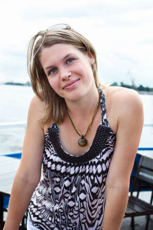 Portrait of expression caucasian young woman in dress. Outdoorsの写真素材