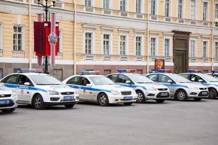 Saint-Petersburg, Russia - May 5 - Russian policeman vehicles parking in line in Palace square のeditorial素材