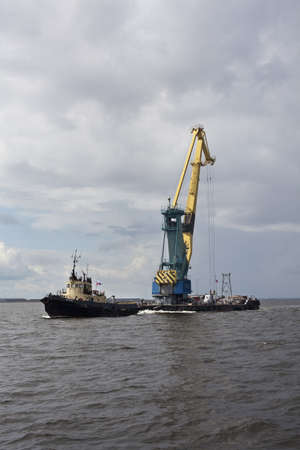 St. Petersburg, Russia  July 17: Transportation floating crane in the Finnish Gulf in Saint-Petersburg, Russiaのeditorial素材