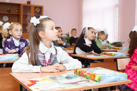 SAINT-PETERSBURG, RUSSIA - September 1: Karina Kravtsova, 7, from Vsevolozhsk, Russia first time in first class in school September 1, 2011in Saint-Petersburg, Russia.のeditorial素材