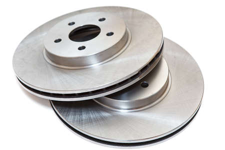 New two brake discs isolated on white backgroundの写真素材