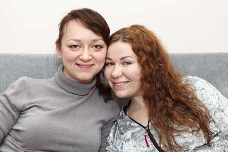 Two beautiful young women togetherの写真素材
