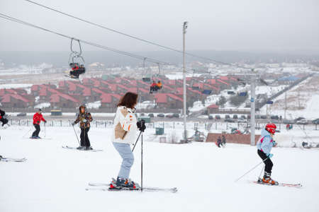 KUROVO VILLAGE, RUSSIA - JANUARY 12: Russian ski resorts Sorochany in winter season with resting people in Moscow Region, Dmitrovsky District on January 6, 2012 in Kurovo village, Russia.のeditorial素材