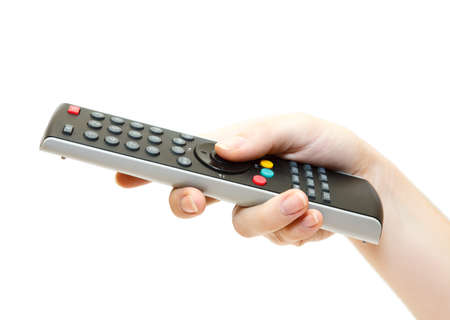 Female hand with remote control isolated on white backgroundの写真素材