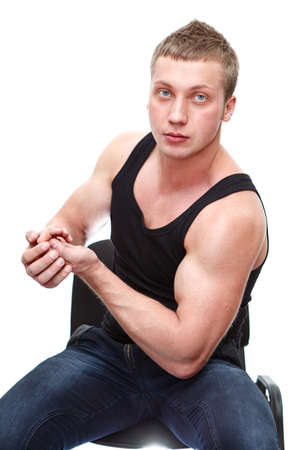 One handsome Caucasian musculan man in black t-shirt isolated on white backgroundの写真素材