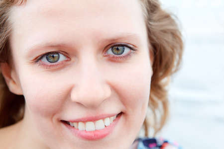 Caucasian woman smiling clean face close up. Copy spaceの写真素材