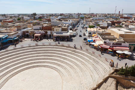 EL DJEM, TUNISIA - CIRCA MAY, 2012: Tunisian amphitheater in El Djem, Tunisia. Entrance area with small townのeditorial素材