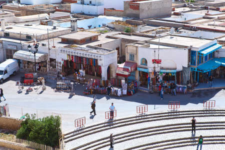 EL DJEM, TUNISIA - CIRCA MAY, 2012: Tunisian amphitheater in El Djem, Tunisia. Entrance area with small townのeditorial素材