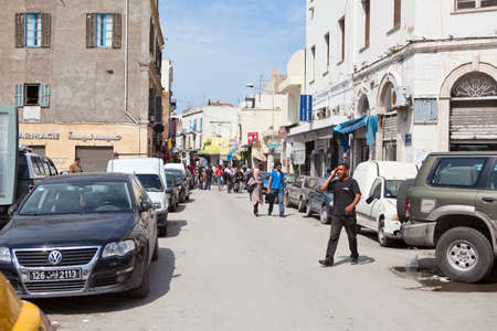 TUNIS CITY, TUNISIA - CIRCA MAY, 2012: Street in Medina in Tunis capital with people on circa May,...