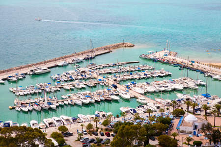 SIDI BOU SAID, TUNISIA - CIRCA MAY, 2012: Top view on port with yachts of Sidi Bou Said town, on circa May, 2012 in Sidi Bou Said town, Tunisia.のeditorial素材