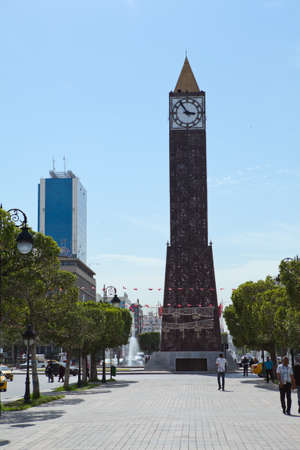 TUNIS, TUNISIA - CIRCA MAY, 2012: The central alley and Tower of Big Ben clock in the center of capital, on circa May, 2012 in Tunis, Tunisia.のeditorial素材