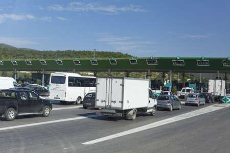 SOUSSE, TUNISIA - CIRCA MAY, 2012: Queue to terminals for pay on chargeable route between Tunis capital and Sousse, on circa May, 2012 in Sousse, Tunisia.のeditorial素材