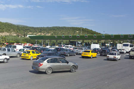 SOUSSE, TUNISIA - CIRCA MAY, 2012: Queue to terminals for pay on chargeable route between Tunis capital and Sousse, on circa May, 2012 in Sousse, Tunisia.のeditorial素材