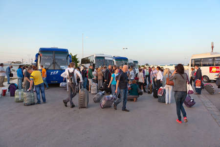 MONASTIR, TUNISIA - CIRCA MAY, 2012: Tourists waiting bus transfer from Monastir International...