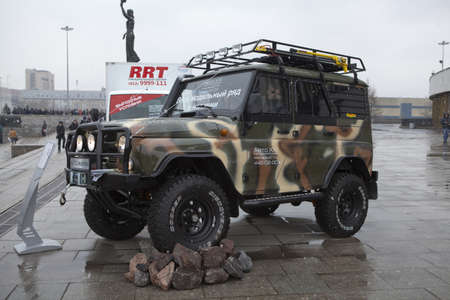 SAINT-PETERSBURG, RUSSIA - CIRCA MARCH, 2012: UAZ Hunter on exhibition near Sport Concert Arena, on circa March, 2012 in Saint-Petersburg, Russiaのeditorial素材