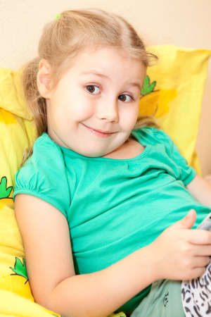 Preschool child smiling at the cameraの写真素材