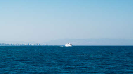 View from ship in sea at skyline of Cyprus Islandの写真素材