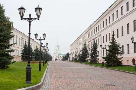 KAZAN CITY, RUSSIA - SEPTEMBER 25: Street Sheykmana and Spassky Tower on September 25, 2011 in Kazan city, Russia. Kazan Kremlin is Russian the chief historic citadel of Tatarstanのeditorial素材