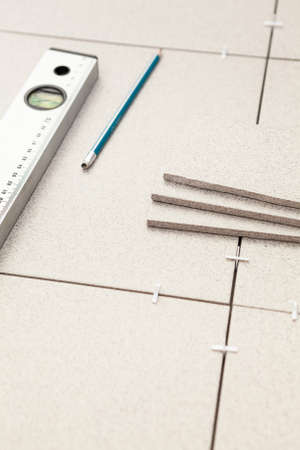 Works on laying of porcelain tiles