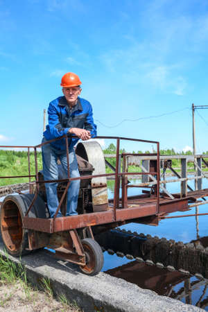 Portrait of senior engineering worker in the water treatment plant
