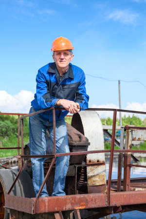 Portrait of senior manual worker in the water treatment plant