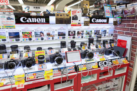 Showcase large Japanese store Bic Camera with cameras and lenses for Canon on circa April 2013 in Tokyo, Japan  Bic Camera Inc is consumer electronics retailer chainのeditorial素材