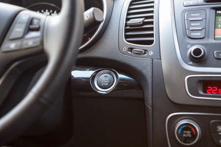 Dashboard of the car with the engine startup button