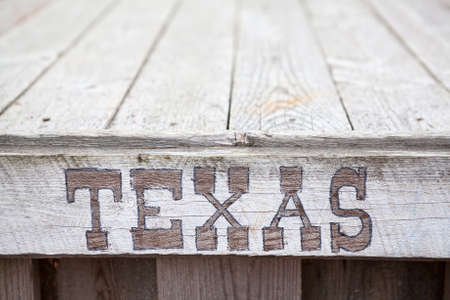 Texas inscription on wooden plateの写真素材