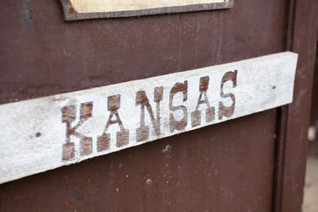 Kansas inscription on wooden plate
