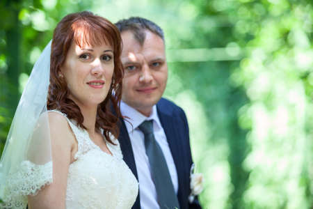 Head and shoulders portrait of young wedding couple, copyspaceの写真素材