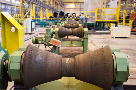 Tube-rollers at the factory for the manufacture of pipesのeditorial素材