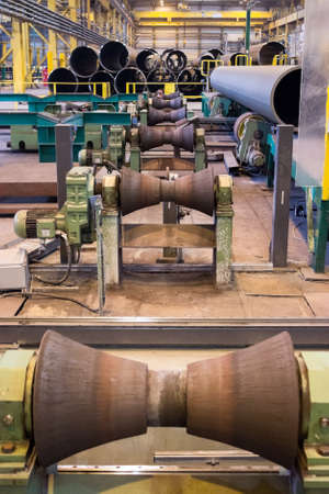 Tube-rollers manufacture line at the pipe rolling factoryのeditorial素材