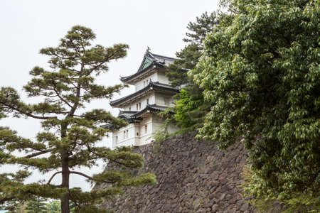 The Fujimi-yagura three-story keep is in the inner park of Tokyo Imperial Palace, Japan. The Tokyo Imperial Palace is the main residence of the Emperor of Japanのeditorial素材