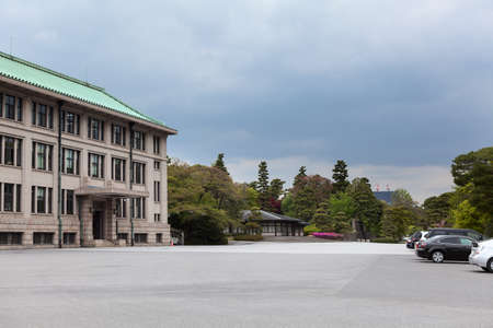 TOKYO, JAPAN - CIRCA APR, 2013: Car parking area is near Imperial Household Agency building at inner area of Tokyo Imperial Palace. Tokyo Imperial Palace is the main residence of the Emperor of Japanのeditorial素材