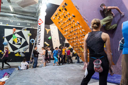 SAINT-PETERSBURG, RUSSIA - CIRCA FEB, 2015: Rock-climbing championship is in IgelsClub. Sportsmen...