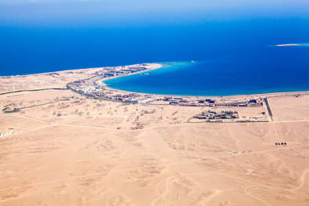 Aerial view at the sandy desert terrain and Red sea coast in Hurghada, Egypt