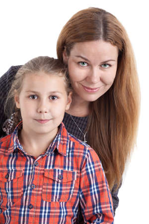 Close up portrait of young mother with her daughter, isolated on white background