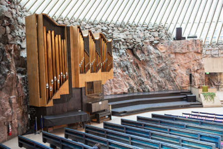 HELSINKI, FINLAND - CIRCA SEP, 2016: Lutheran Church Temppeliaukio is in Toolo, Helsinki suburbs. The church organ is near a rock wall. Interior, view from the balconyのeditorial素材