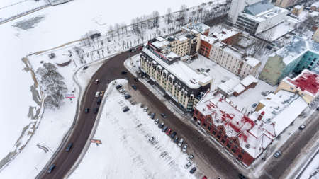 VYBORG, RUSSIA - CIRCA JAN, 2017: Colorful buildings are in the middle of Lenin avenue and embankment. The Market Square. Vyborg is town in Leningrad Oblast. Aerial viewのeditorial素材