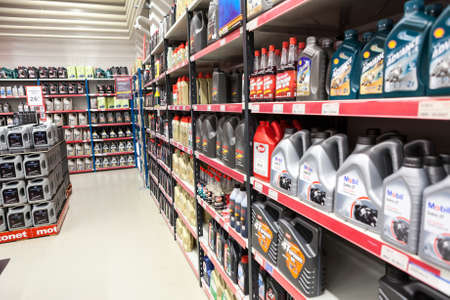 LAPPEENRANTA, FINLAND - CIRCA FEB, 2016: A lot of motorcycle oils and lubricants are in motorbike store. The Motonet is a large chain retailer of auto and motorcycle goods in Finlandのeditorial素材