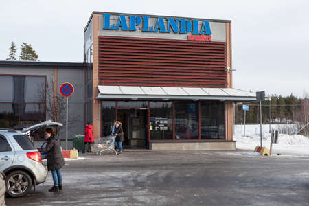 NUIJAMMAA, FINLAND - CIRCA FEB, 2017: Building of shopping mall of the Laplandia market is located on Russian-Finnish border. Entrance doors. Popular place for Russian touristsのeditorial素材