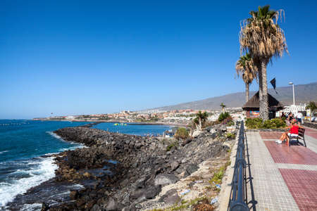 COSTA ADEJE, TENERIFE, SPAIN-CIRCA JAN, 2016: Viewpoint is on the promenade with beautiful view at the Atlantic ocean. Torviscas and Fanabe are city resorts with grey sandのeditorial素材